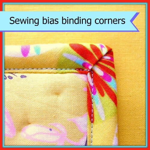 Turning corners with bias binding.  How to get nice neat, sharp and even corners front and back.