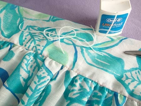 At last!  A quick and easy way to gather long pieces of fabric with out breaking the gathering threads, ever.  The secret is in the dental floss!