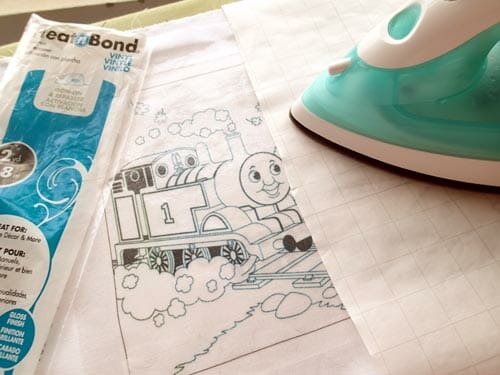 Make a wipe clean dry erase coloring placemat for toddlers using Iron on Vinyl.