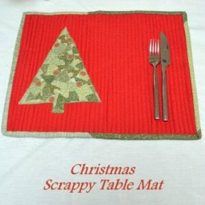 Scrappy Christmas Table Mat tutorial. That tree is made up of all the tiniest pieces - how its done is genius!